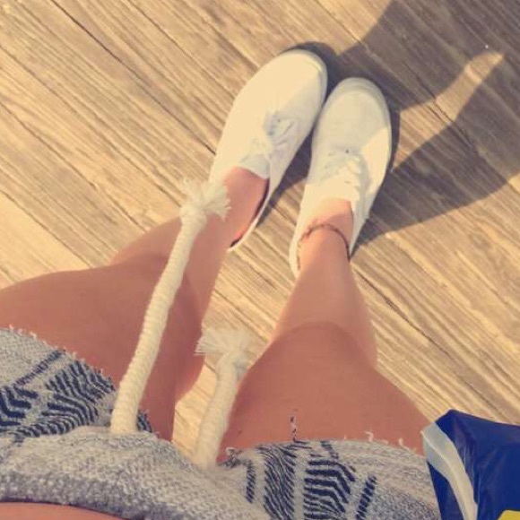 White tennis shoes. Air walk