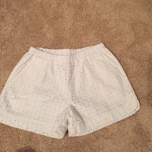Never worn!! White eyelet shorts