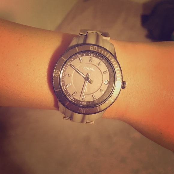 Grey and white fossil watch