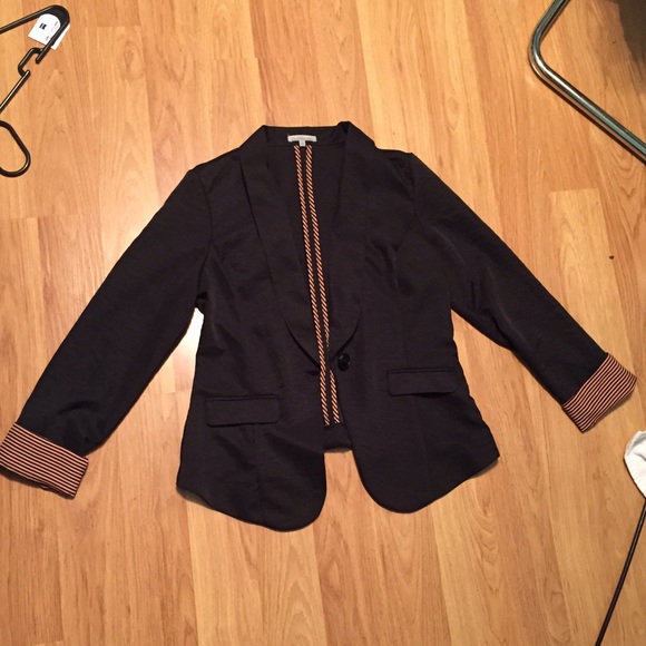 Black blazer with pink accents