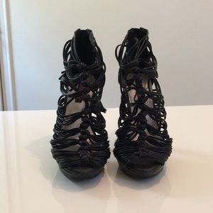 Black sandal heels lace up with tassel