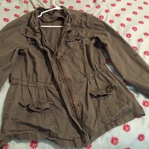 Green "katniss" jacket. (Don't know the name) 😂