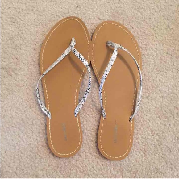 Snake-skin patterned flip-flops