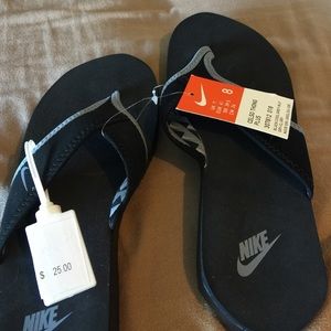 Brand new Nike flip flops
