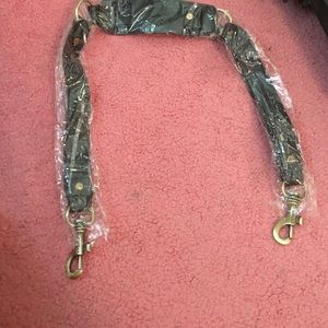 Had a extra coach black long strap for a bag