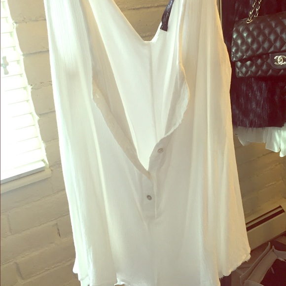 Super cute flowy white romper!
