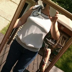 Adorable sleeveless blouse