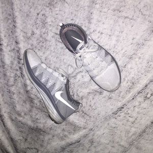 Gray Nike Flyknit running shoes 7.5
