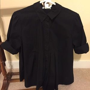 A black button up stripped flare shirt.