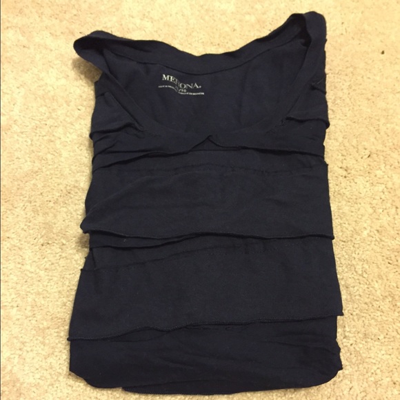 Short sleeve navy ruffled shirt.