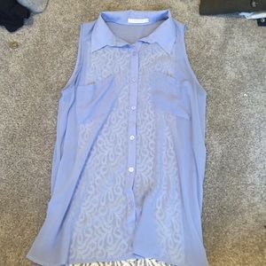Blue sleeveless blouse with lace back