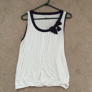 White AT Loft tank top with navy outlines and bow