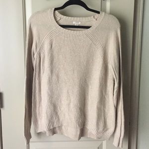 Cream sweater with brown leather elbows