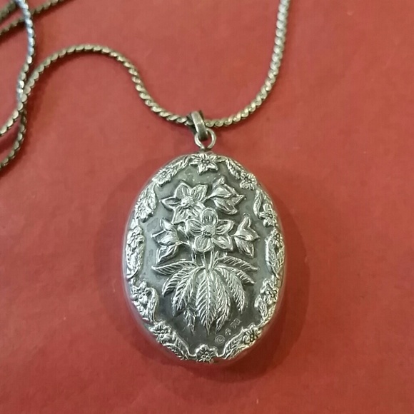 Vintage Jewelry - RESERVED Sterling Silver Floral Repousse Pendant.