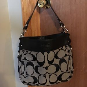 Black Coach bag w/ Aqua inside