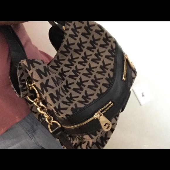 Michael Kors black and taupe signature bag
