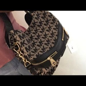 Michael Kors black and taupe signature bag