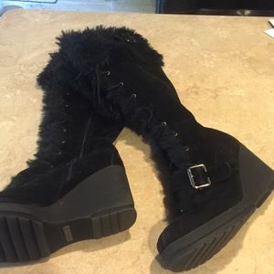 Brand new knee high boots.