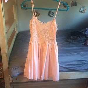 Peach colored lace babydoll dress
