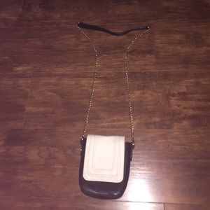 Creme and black mini leather cross body bag