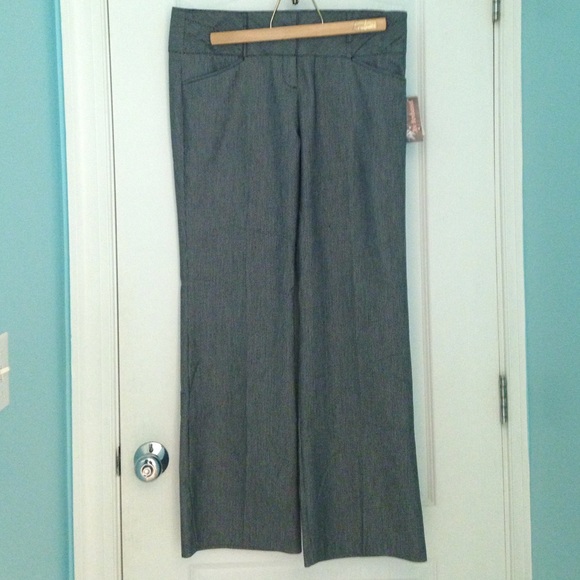 Pin striped black and white slacks. New with tags.