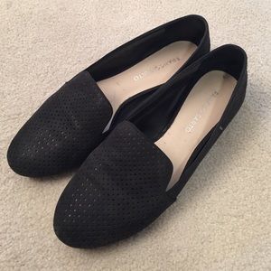 Black perforated leather loafer by Franco Sarto