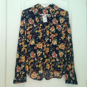 Floral button up with tags still attached.