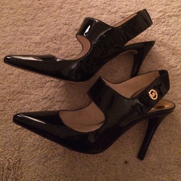 Michael Kors black patent leather shoe.