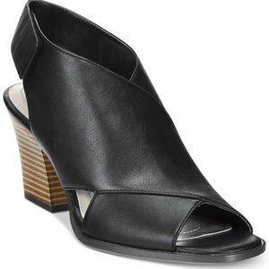 Black round peep-toe lingback sandals