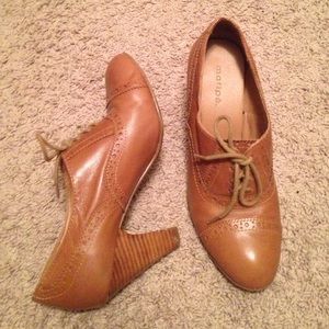 Light brown high heeled Oxford shoes. Worn twice.