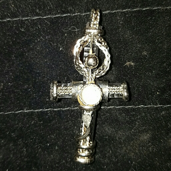 Suede and metal cross pendant