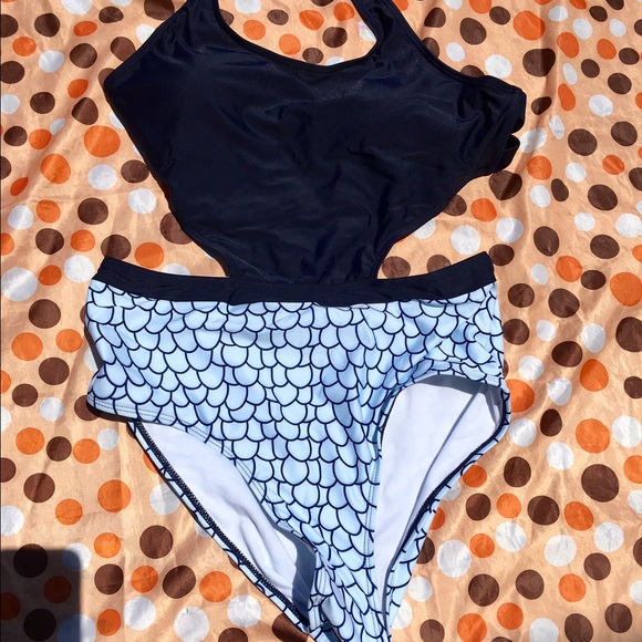 One piece swimsuit size L 10/12  side cutouts OBO