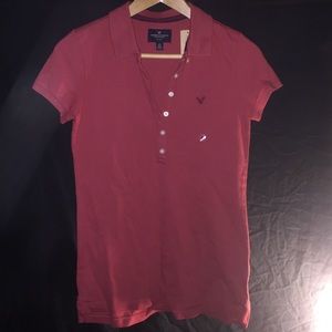2 red American eagle button up shirts.