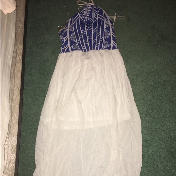 Long white maxi dress ties up top around neck