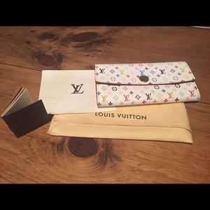 Authentic. Gift receipt, tag and cloth cover.