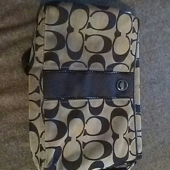Large black and sliver coach purse