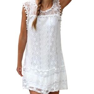 White flowy, lace dress.Never worn.Fits true