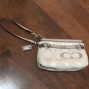 White coach wristlet. Used once! Perfect condition