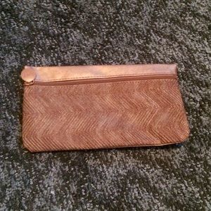 Gold makeup bag