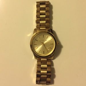 Gold Michael Kors women's watch with date window!