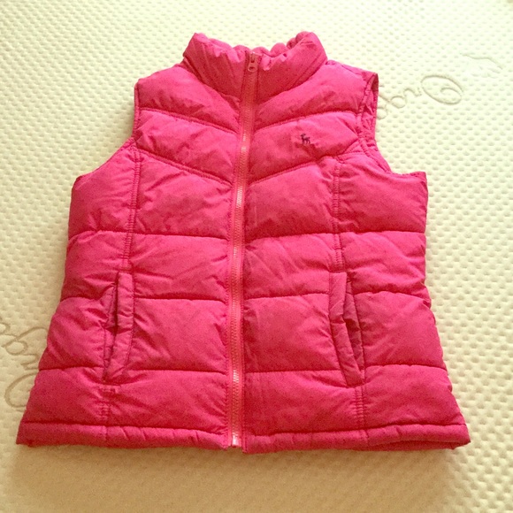 A pink rain jacket vest