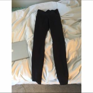 Black LuluLemon Leggings HOLDING