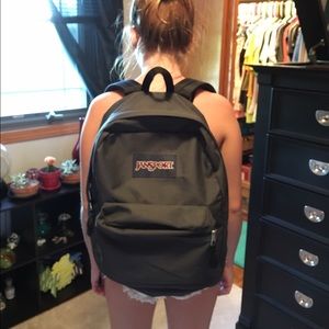 Grey Jansport book-bag