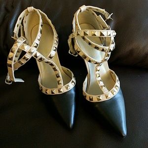 Black and cream studded heels