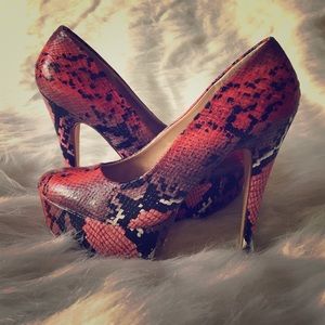 Sultry red faux snakeskin stilettos
