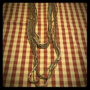 Four strand bronze and silver beaded necklace