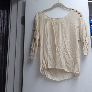 Cream and detailed top