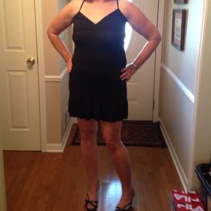 Black summer dress with cute back detailing.