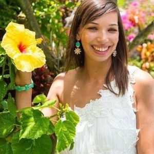 One shoulder White dress with floral attachments