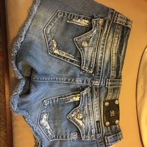 Size 29 Miss Me shorts.